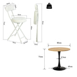 Ensemble de salle à manger de style scandinave comprenant une table ronde en chêne et quatre chaises pliantes blanches