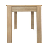 Table à manger rectangulaire en panneaux de particules finition chêne avec quatre pieds robustes