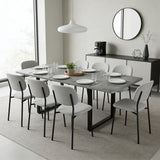Table à manger gris extensible à trois rallonges avec pieds métalliques