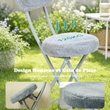 Ensemble de salle à manger de style scandinave comprenant une table ronde en chêne et quatre chaises pliantes grises