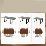 Table à manger gris extensible à trois rallonges avec pieds métalliques