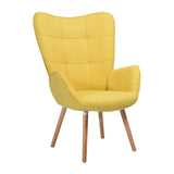 Scandinavian armchair with armrests in yellow fabric with stitching - bogdan