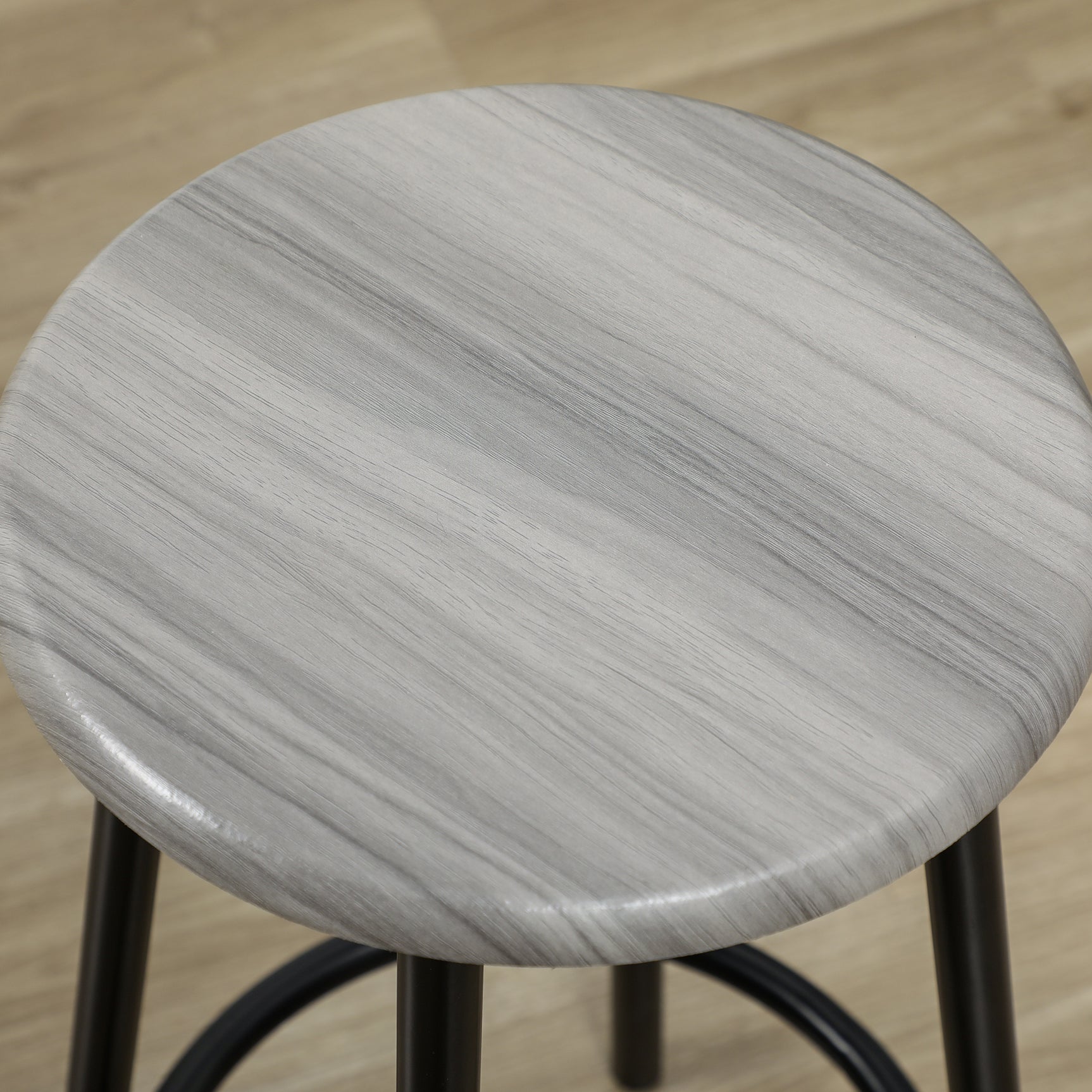 Ensemble de table haute avec quatre tabourets au design industriel gris en métal